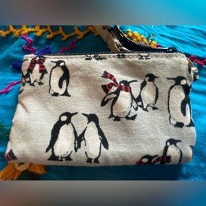 Cute penguin Vera Bradley card case. Measures apx 3 x 5” excellent condition.